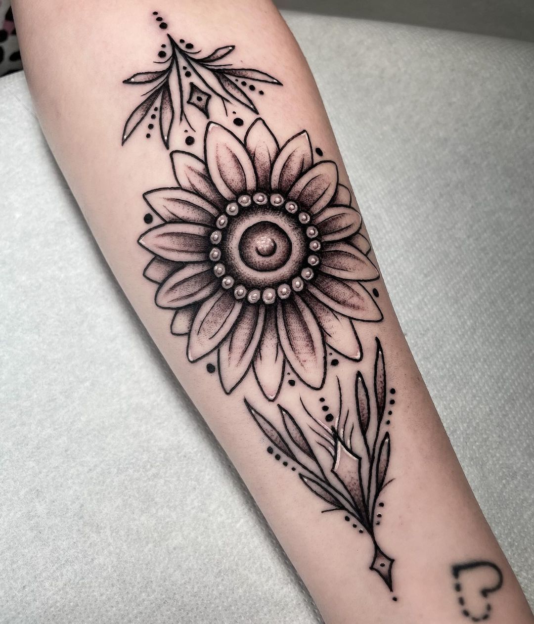 Traditional sunflower tattoo by andyonetotattoo