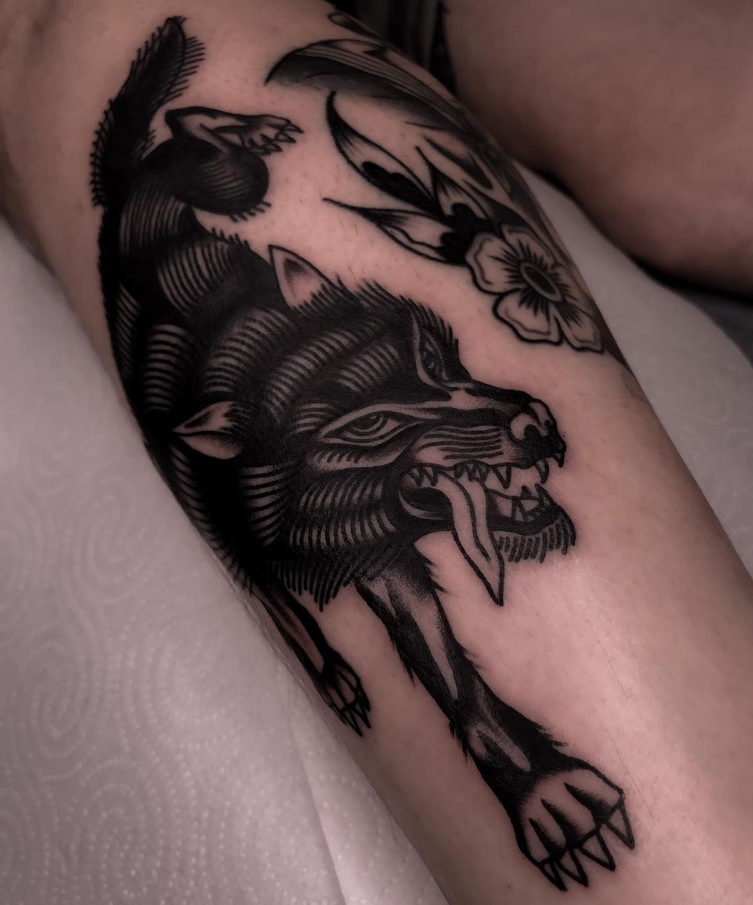 Traditional wolf tattoo by rogozhintt