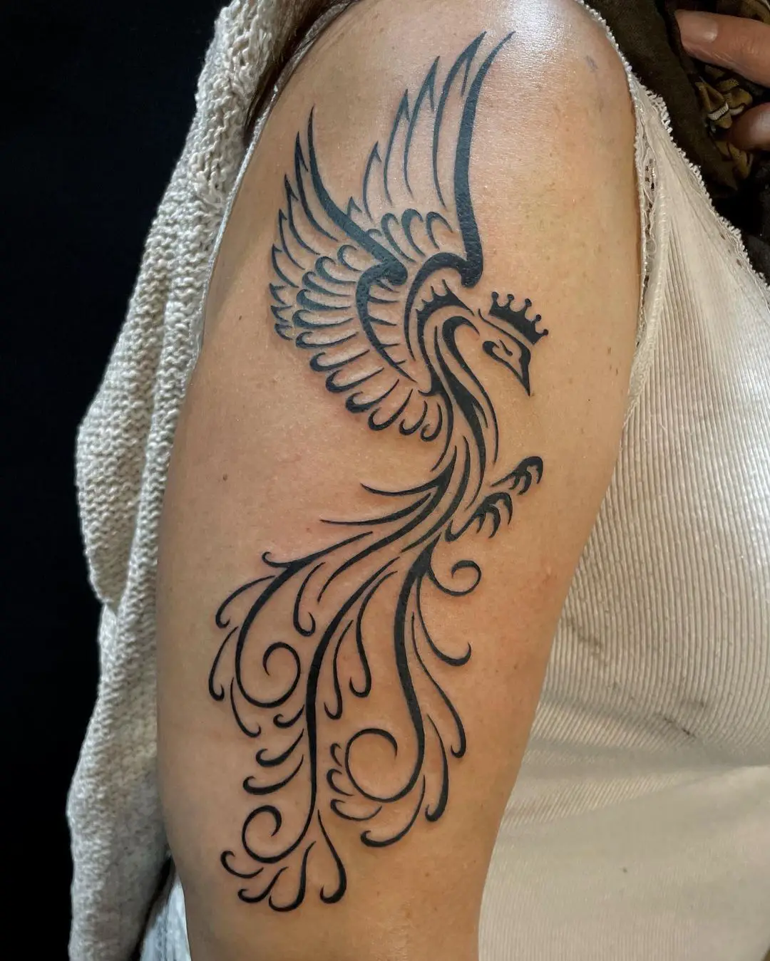 Tribal phoenix tattoo by tengutattooer
