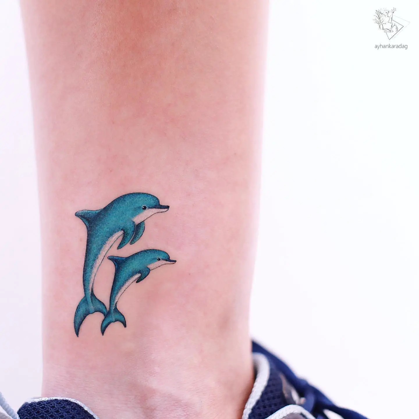Two dolphin tattoo by ayhankrdg