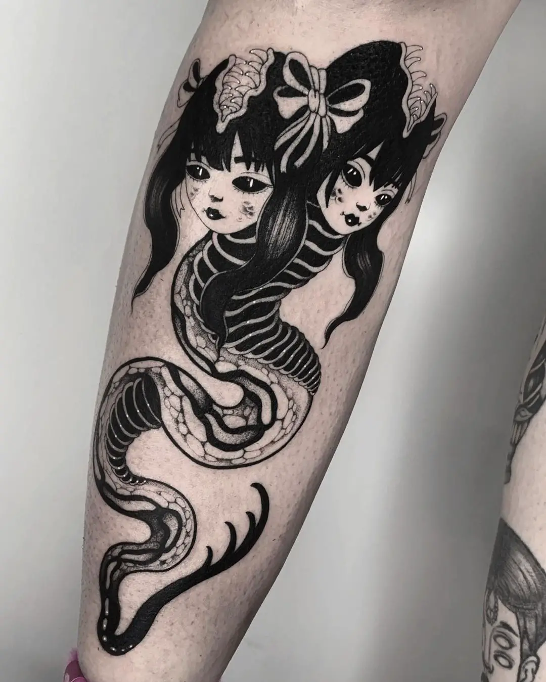 Two headed snake tattoo by