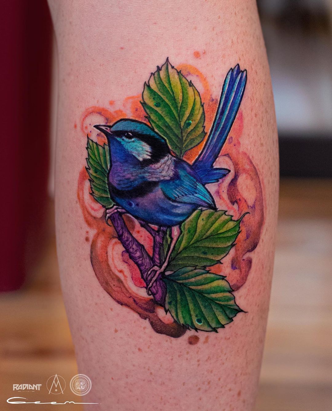 Watercolor bird tattoo by geem tattoo