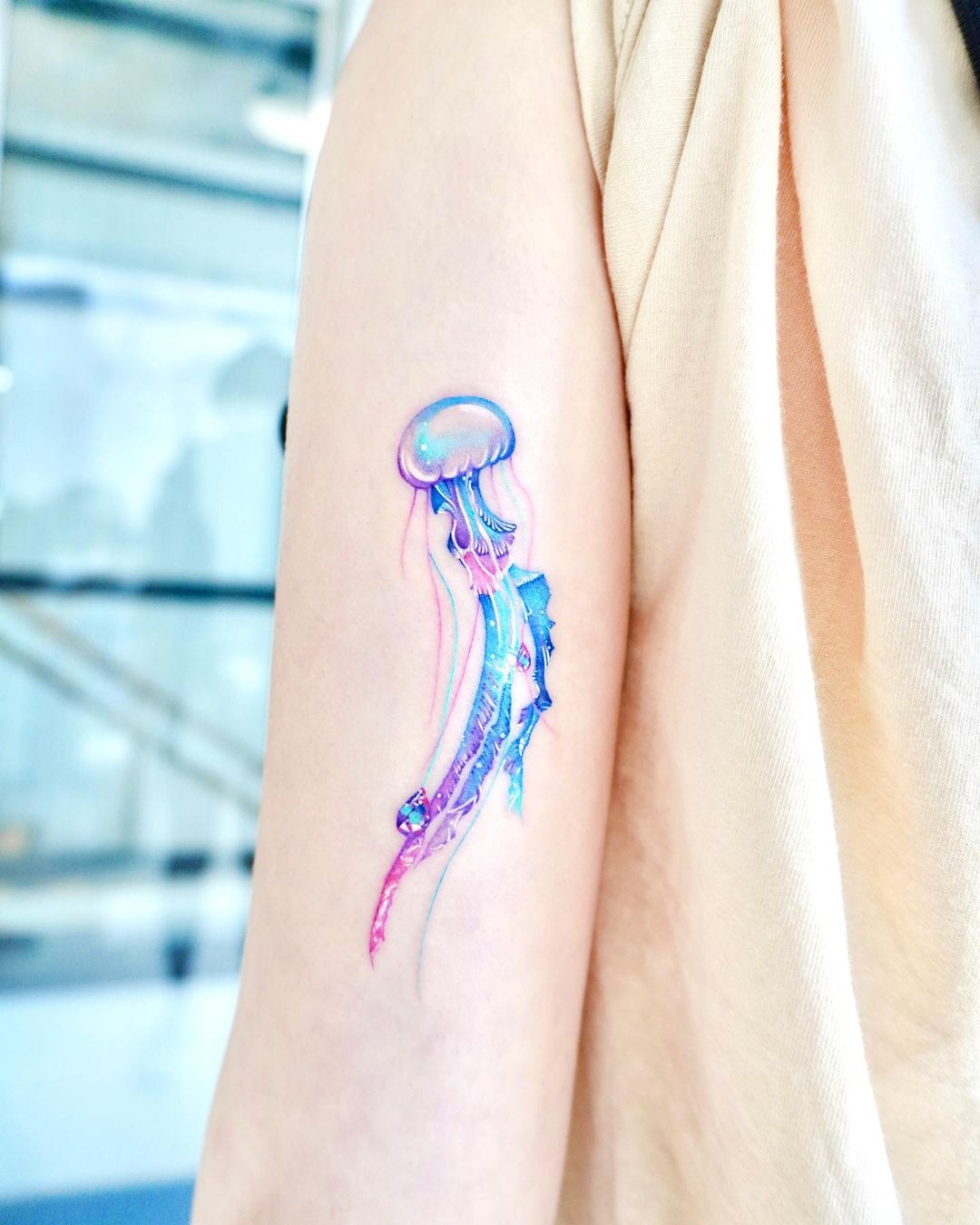 First session of a watercolor jellyfish by Wolf at Charmed Life Gallery in  Baltimore Only took him two hours to do all this Going back for some  orange splashes behind it and