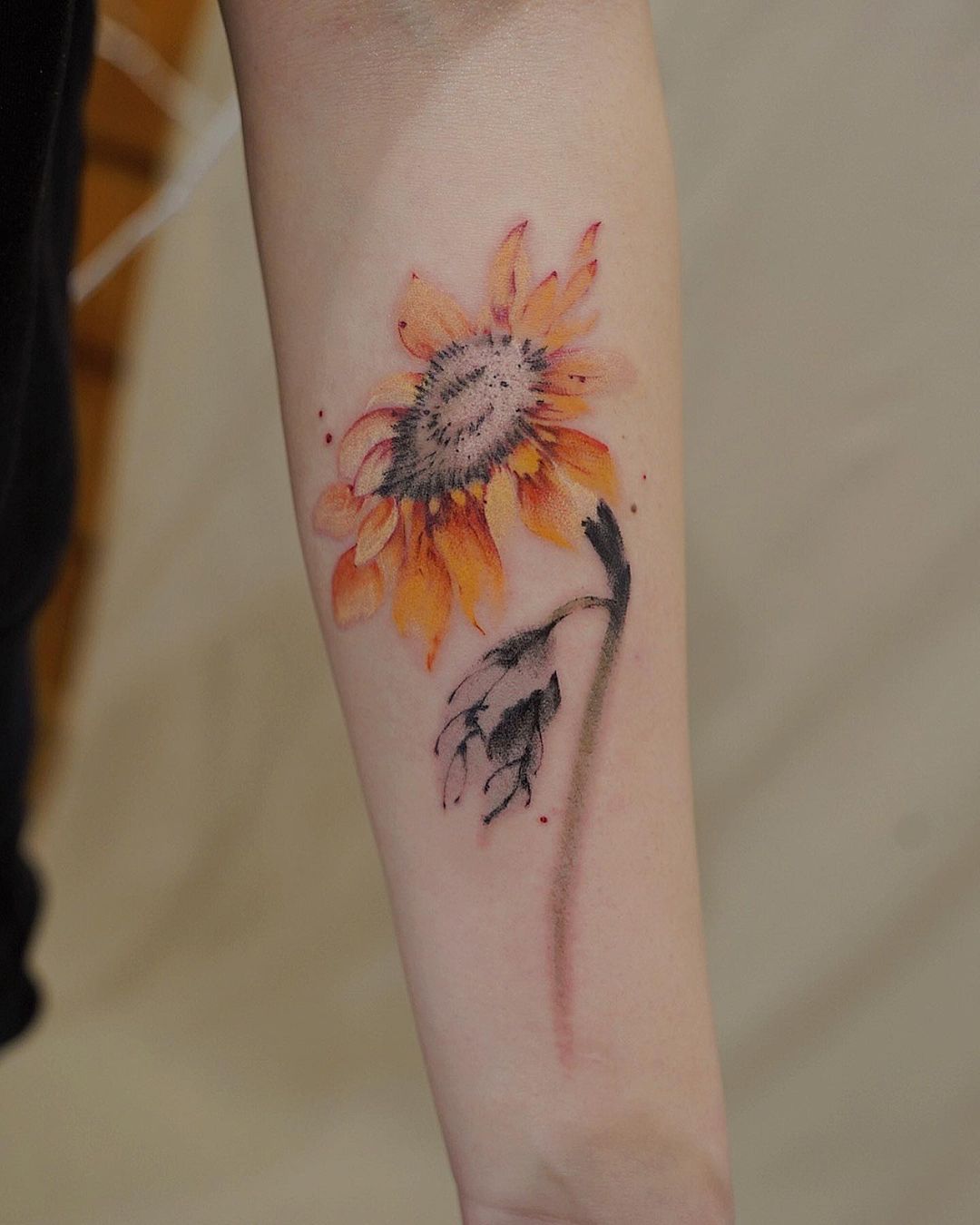 Watercolor sunflower tattoo by koizhou tattooist