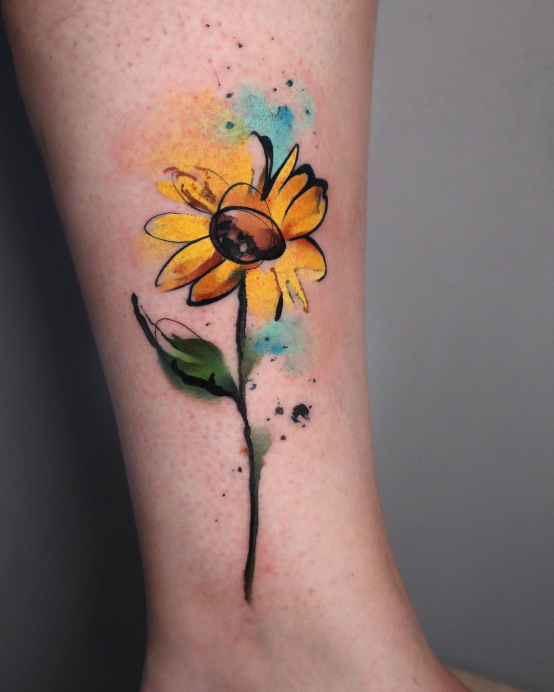 Watercolor sunflower tattoo by pablo ortiz tattoo