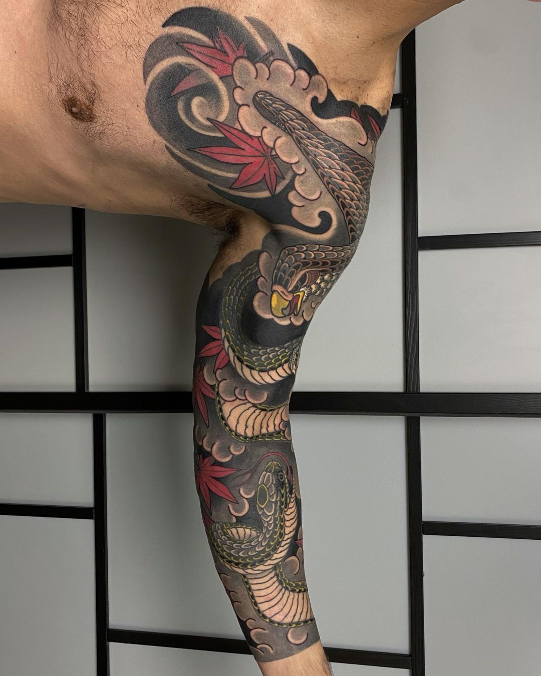 Wrapped snake tattoo by albertosolposto