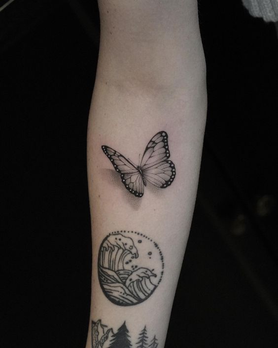 Black and grey butterfly tattoo 1