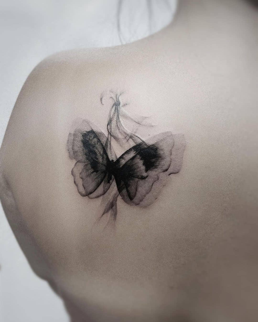 Black and grey butterfly tattoos by m mark tattoos