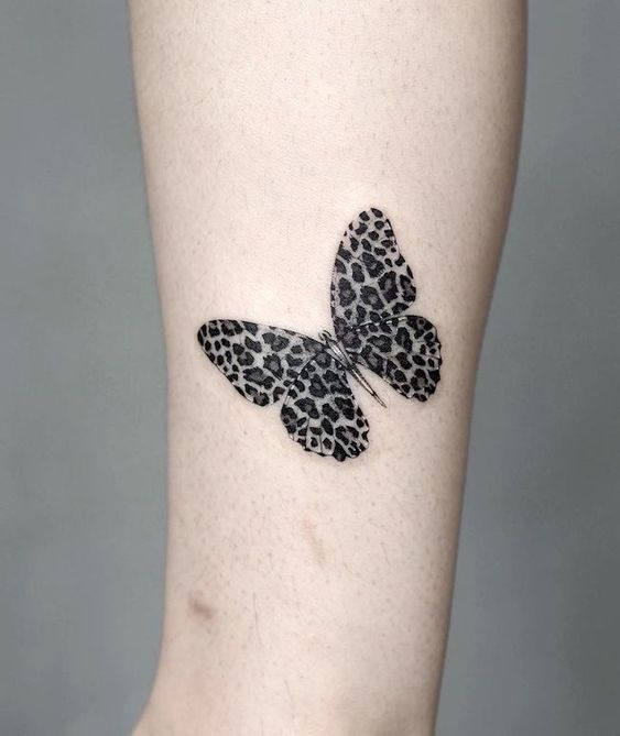 Black and white butterfly tattoo 1