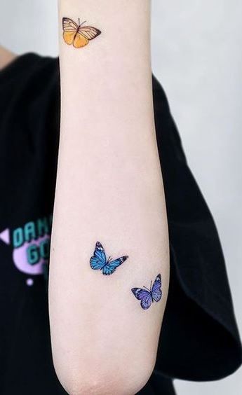 Blue butterfly tattoo 4