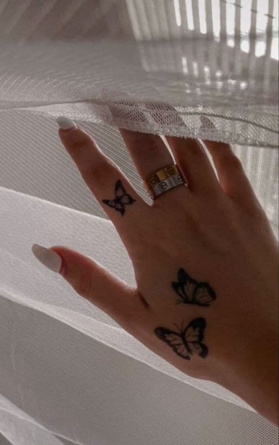 Butterfly hand tattoo 2