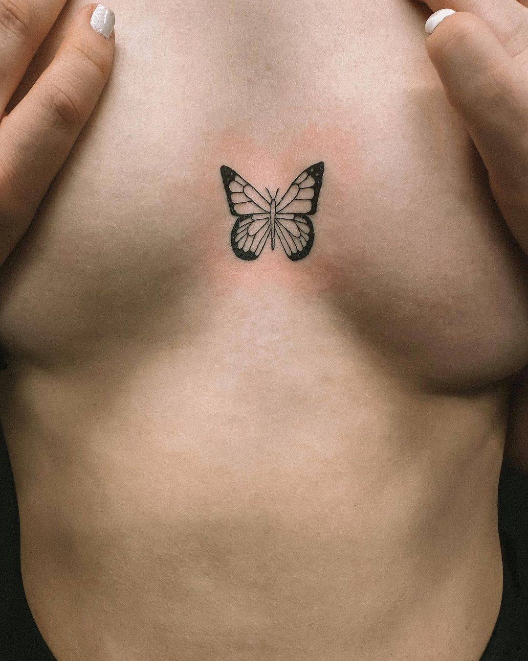Butterfly on chest tattoo by hybirdink heisinki