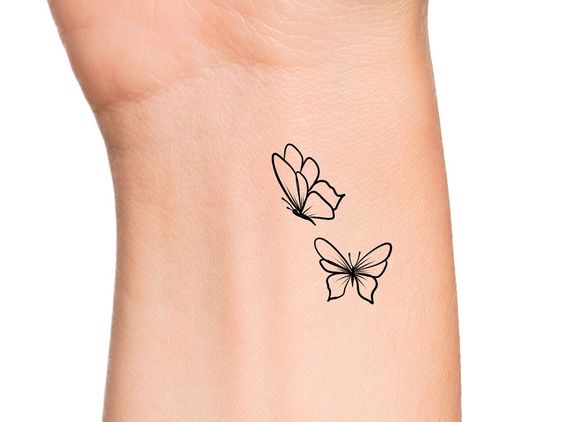 Butterfly on wrist 4