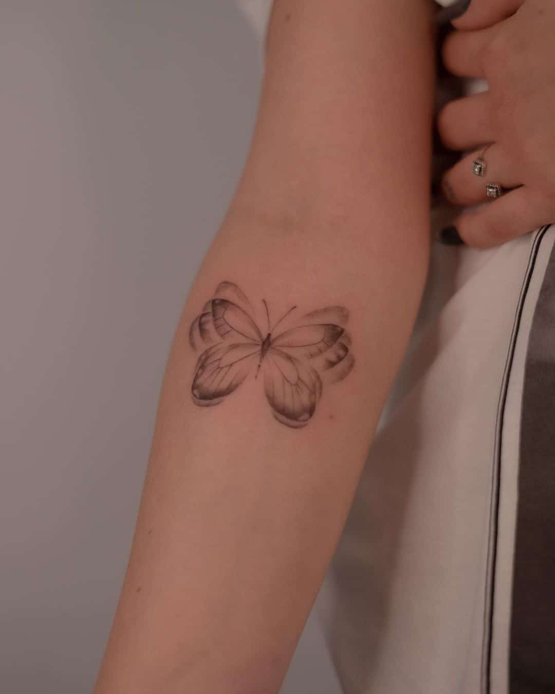 Butterfly tattoo on arm by