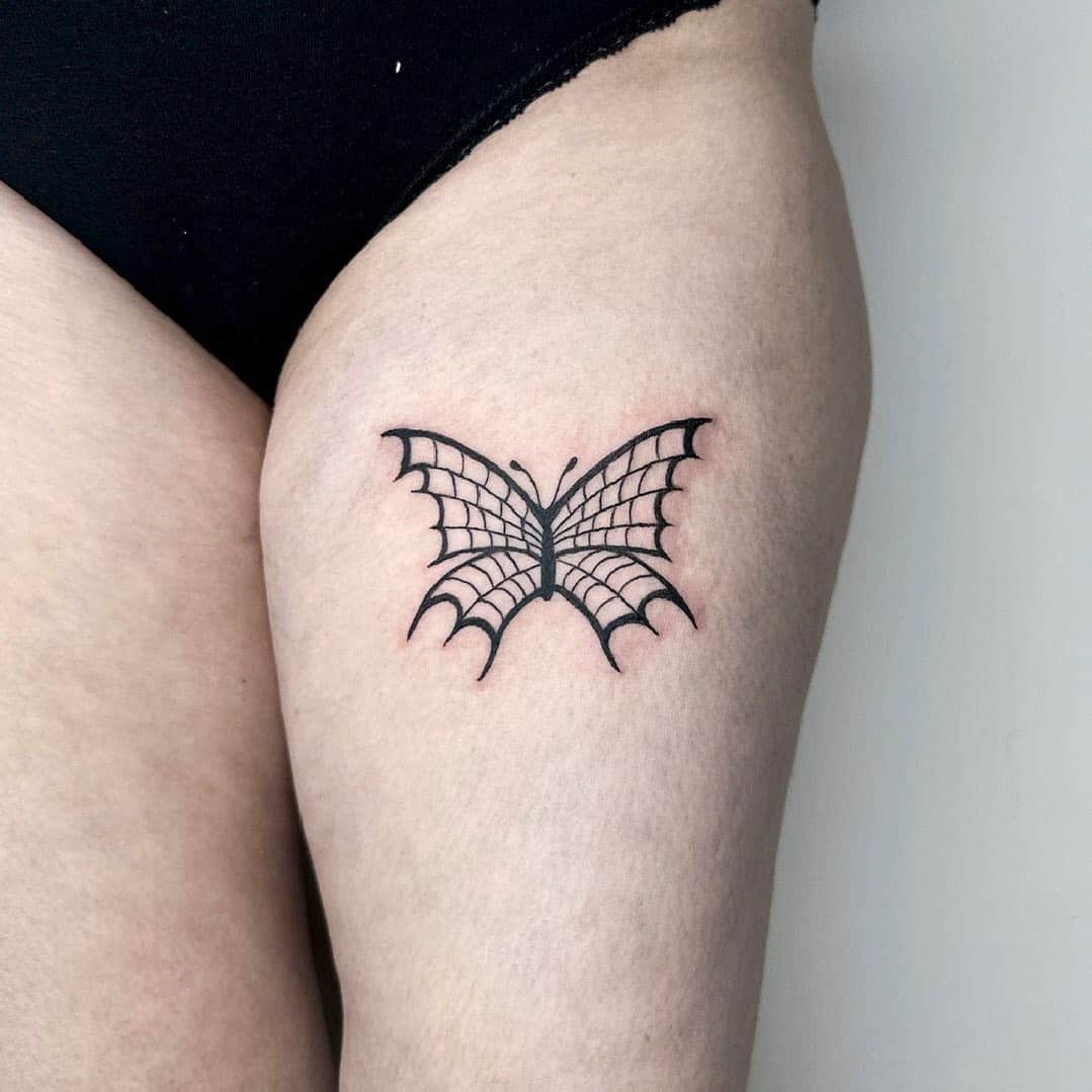 Butterfly tattoo on thigh by tal atlan