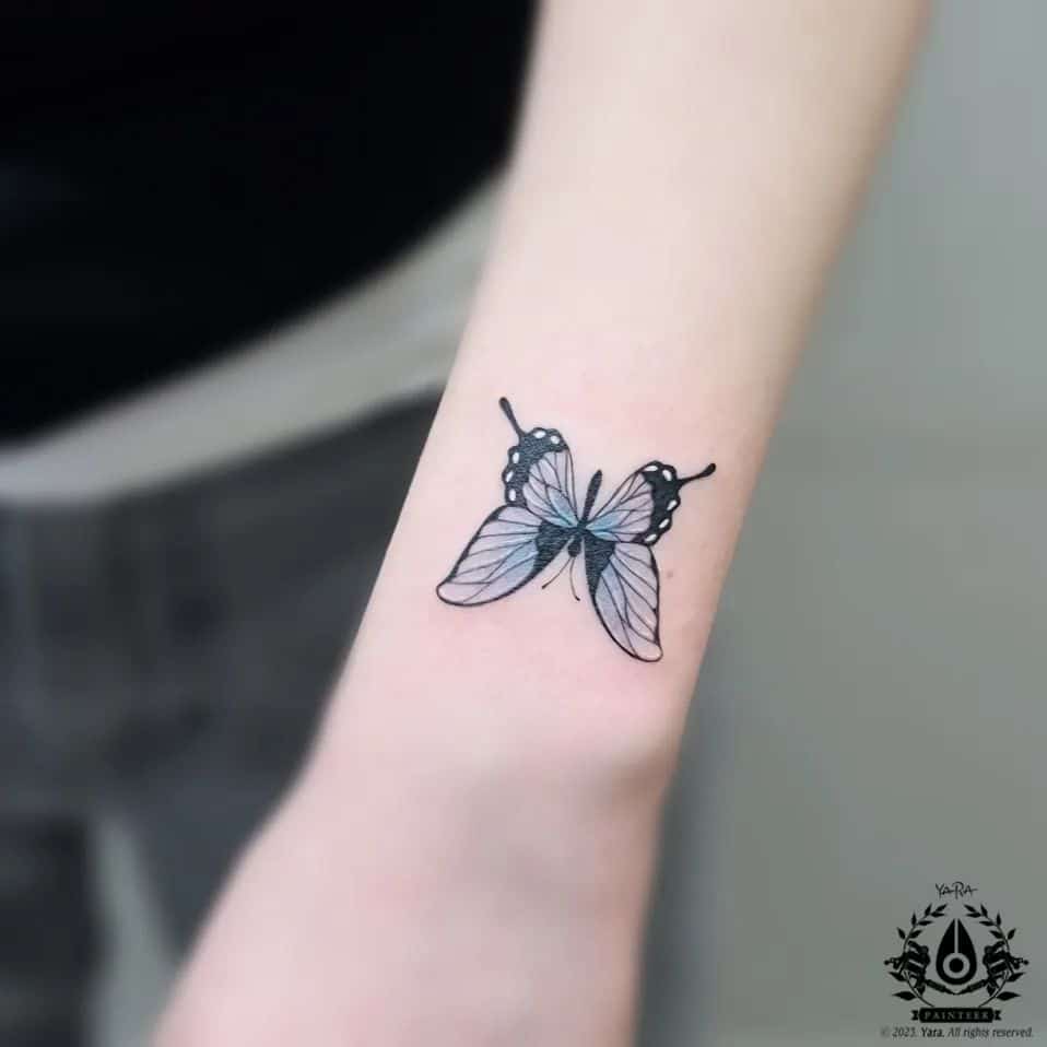 Butterfly tattoo on wrist by tattooist yara