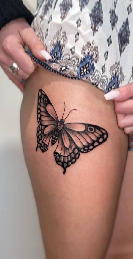 Butterfly thigh tattoo 2