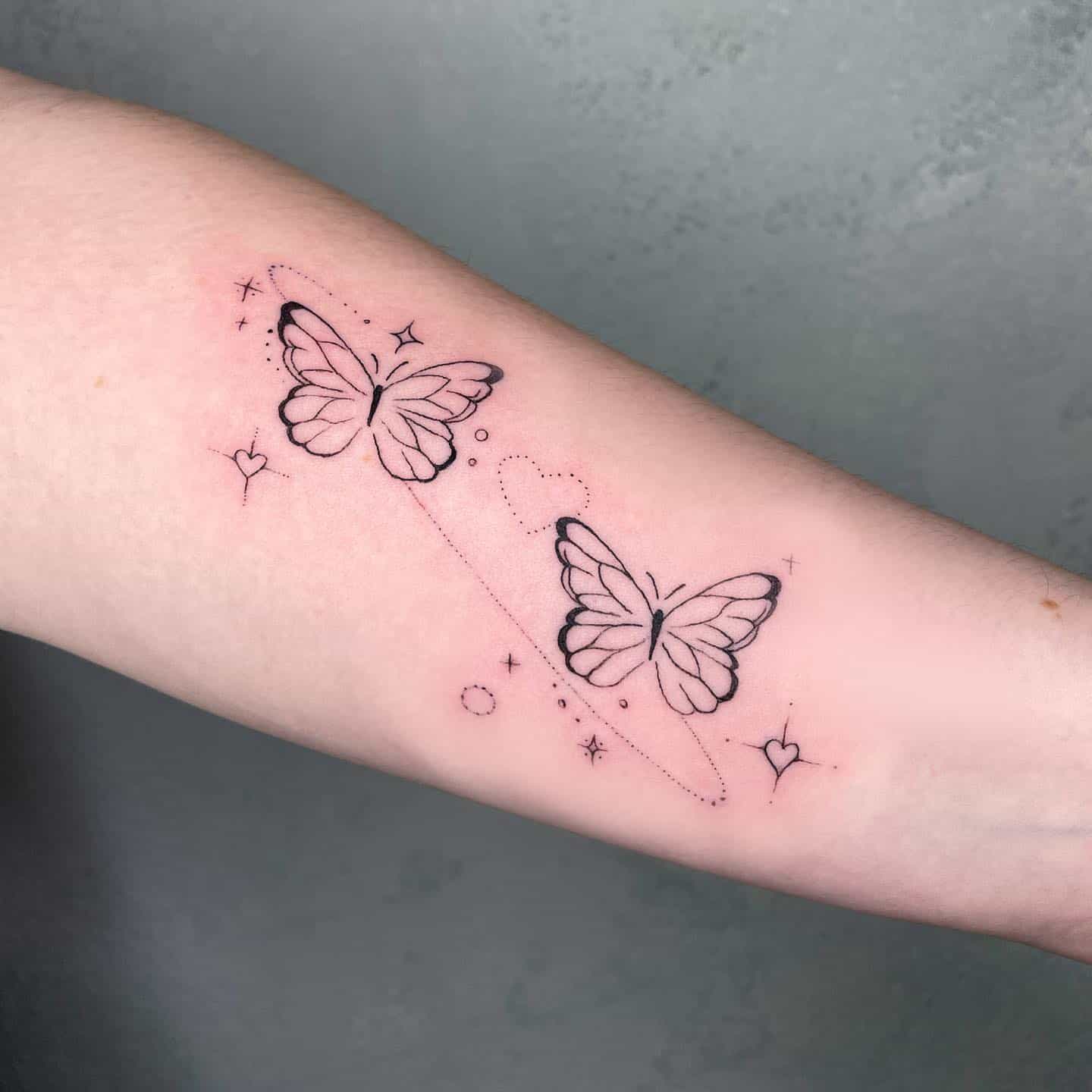 Butterly on sleeve tattoo by