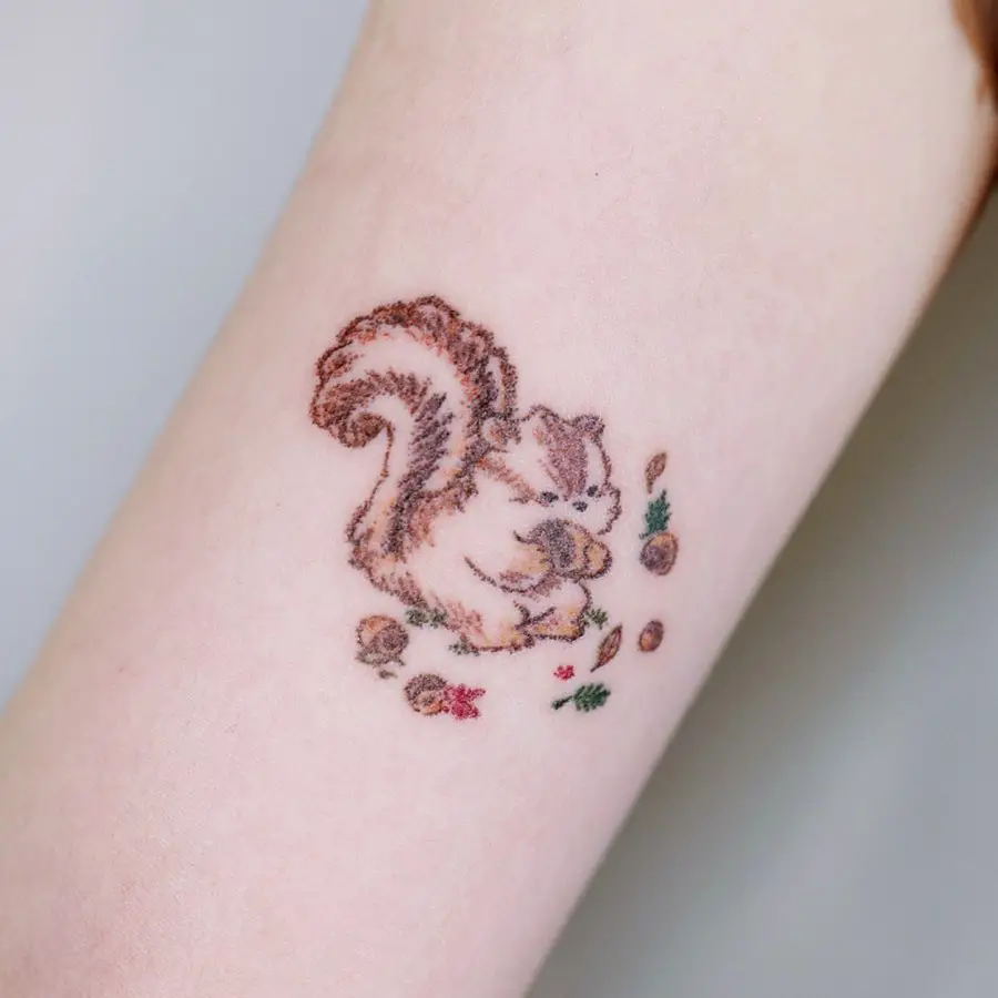 Cartoon designed squirrel tattoo by haenal tattoo