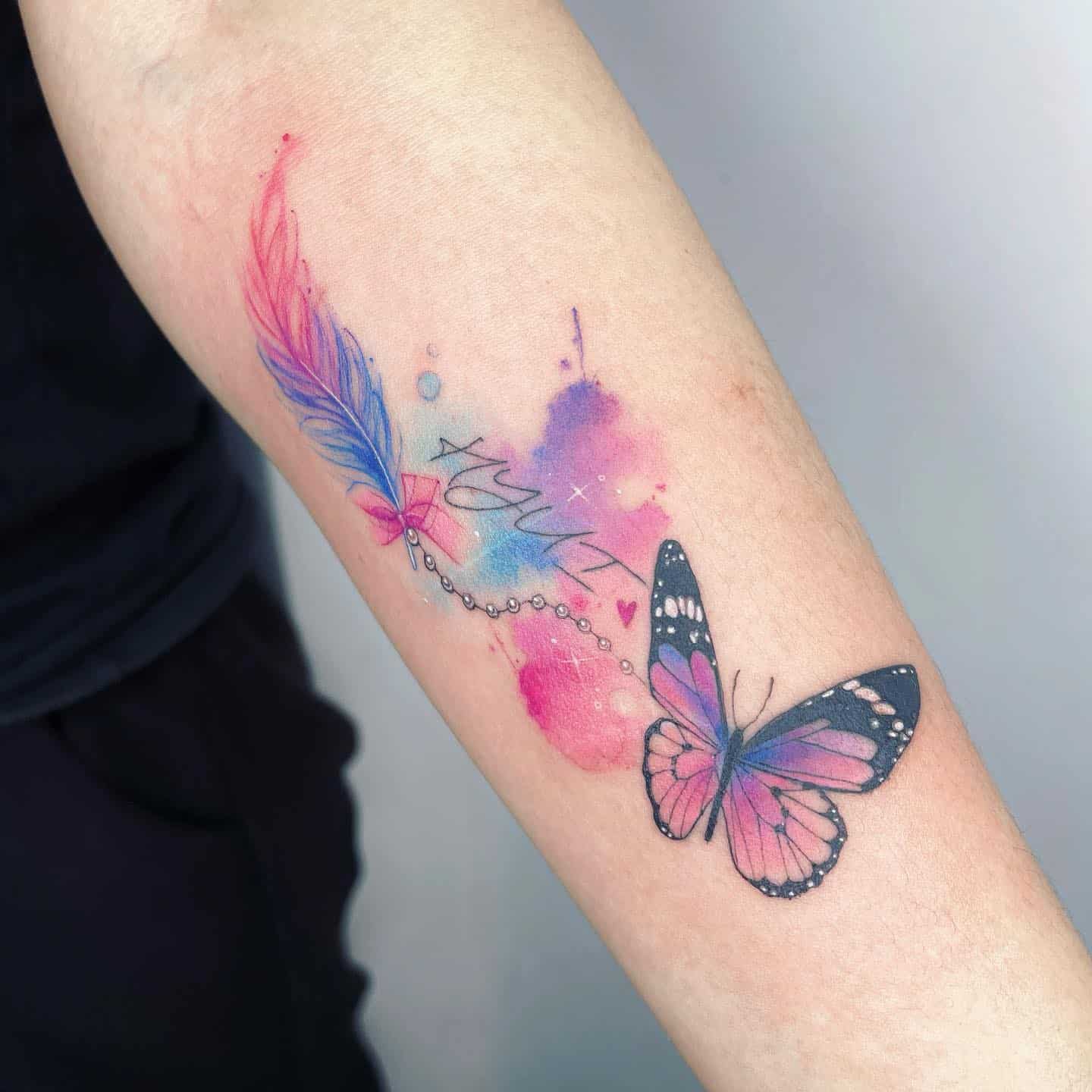 Colorful butterfly tattoo by polly shenyintattoo