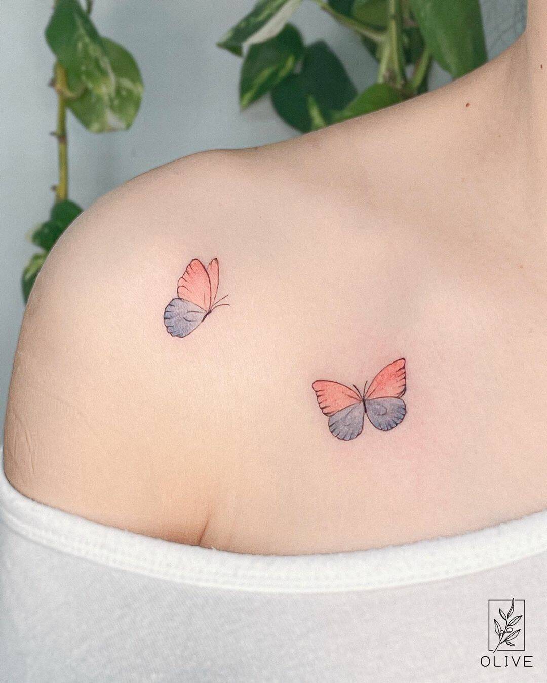 Colorful butterfly tattoo by tattoo olive u