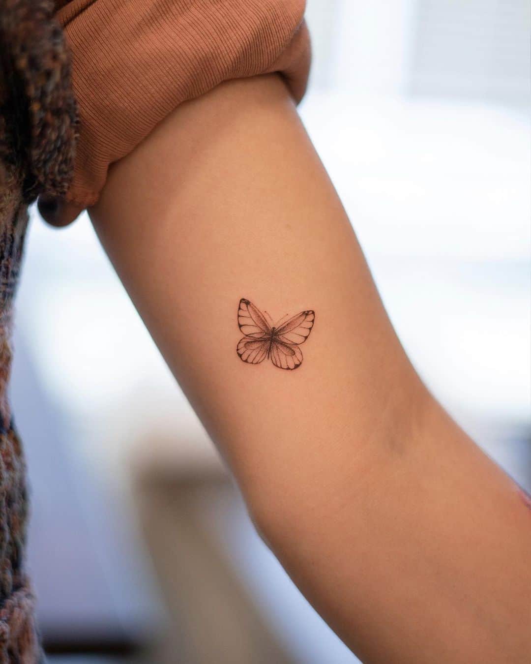Cute butterfly tattoo by handitrip