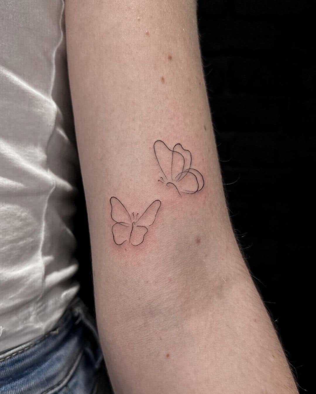 Cute butterfly tattoo by tattooashe