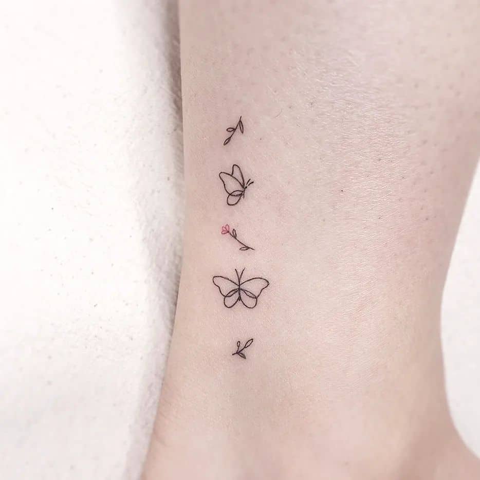 Fineline butterfly tattoo by gorae tattoo
