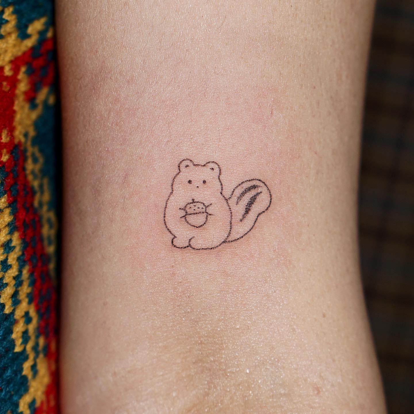 Fineline squirrel tattoo by amoebazoo