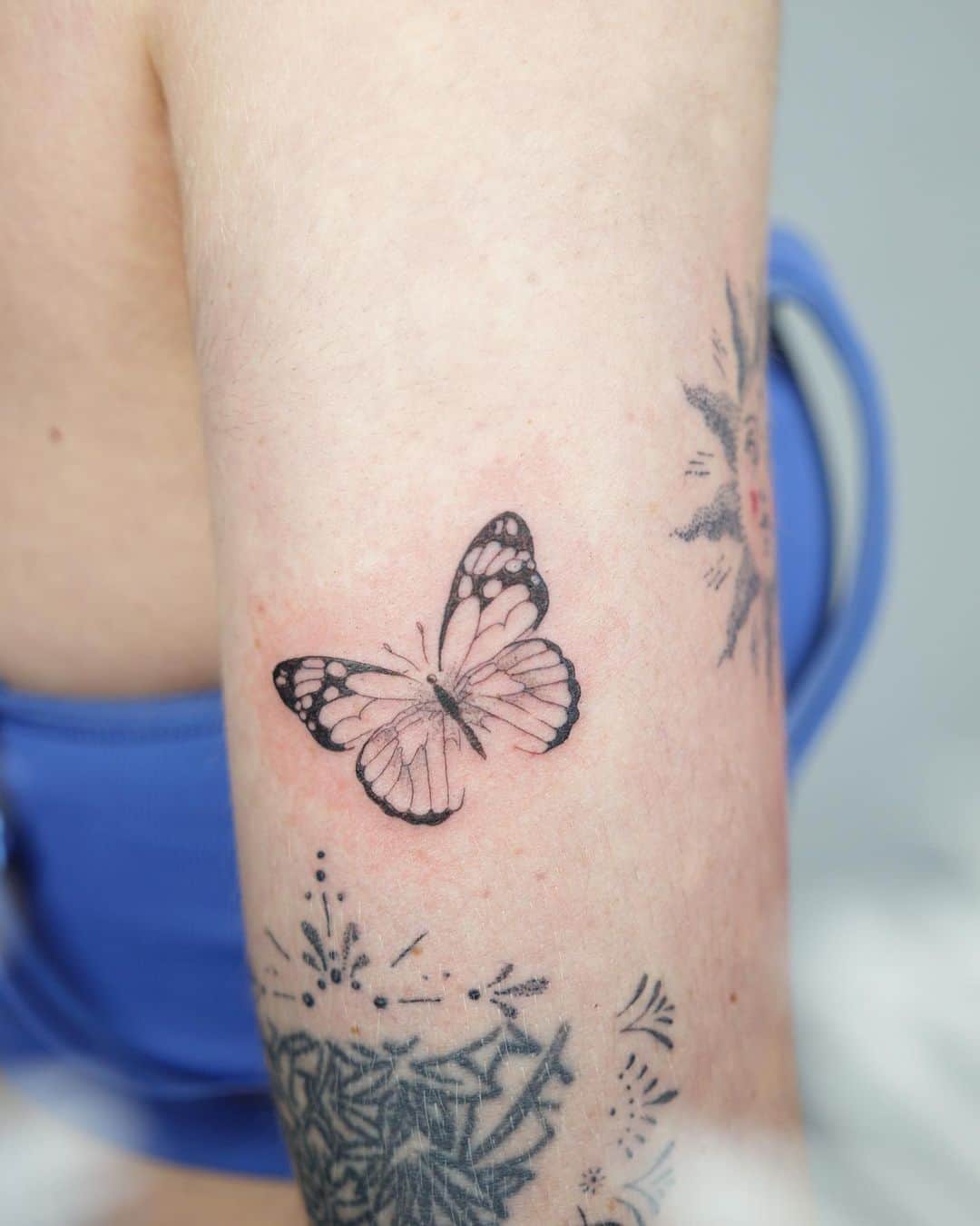Flower on sleeve tattoo by darkroast tattoo