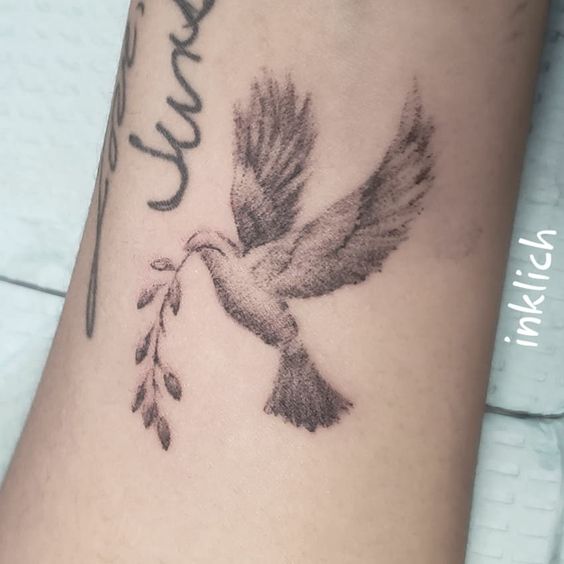 Flying dove tattoo 1