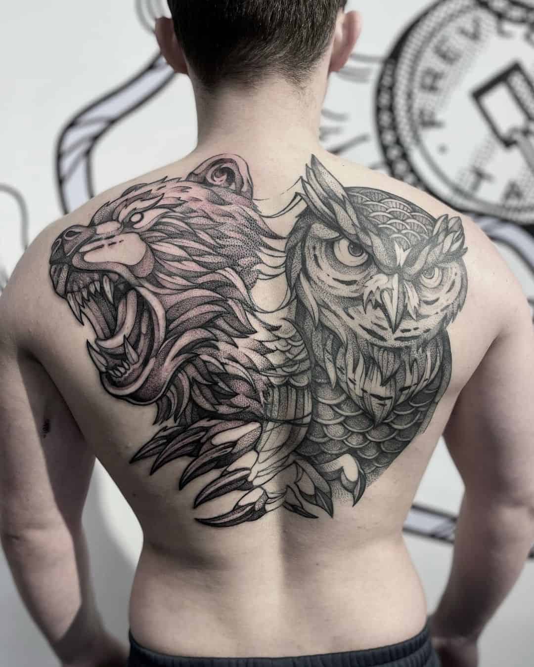Owl on back tattoo by zrick tattoo