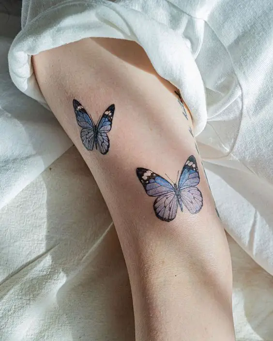 Purple butterfly tattoo 1