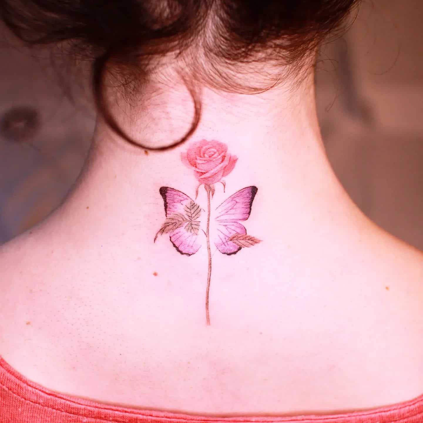 Purple butterfly tattoo by tattooist