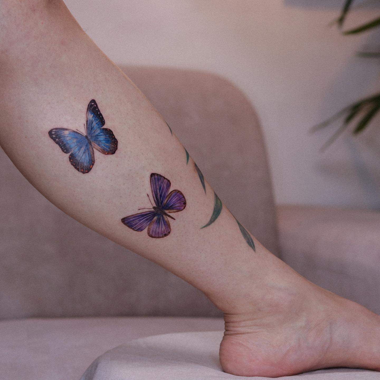 Purplr butterfly tattoo by ro.one tattoo