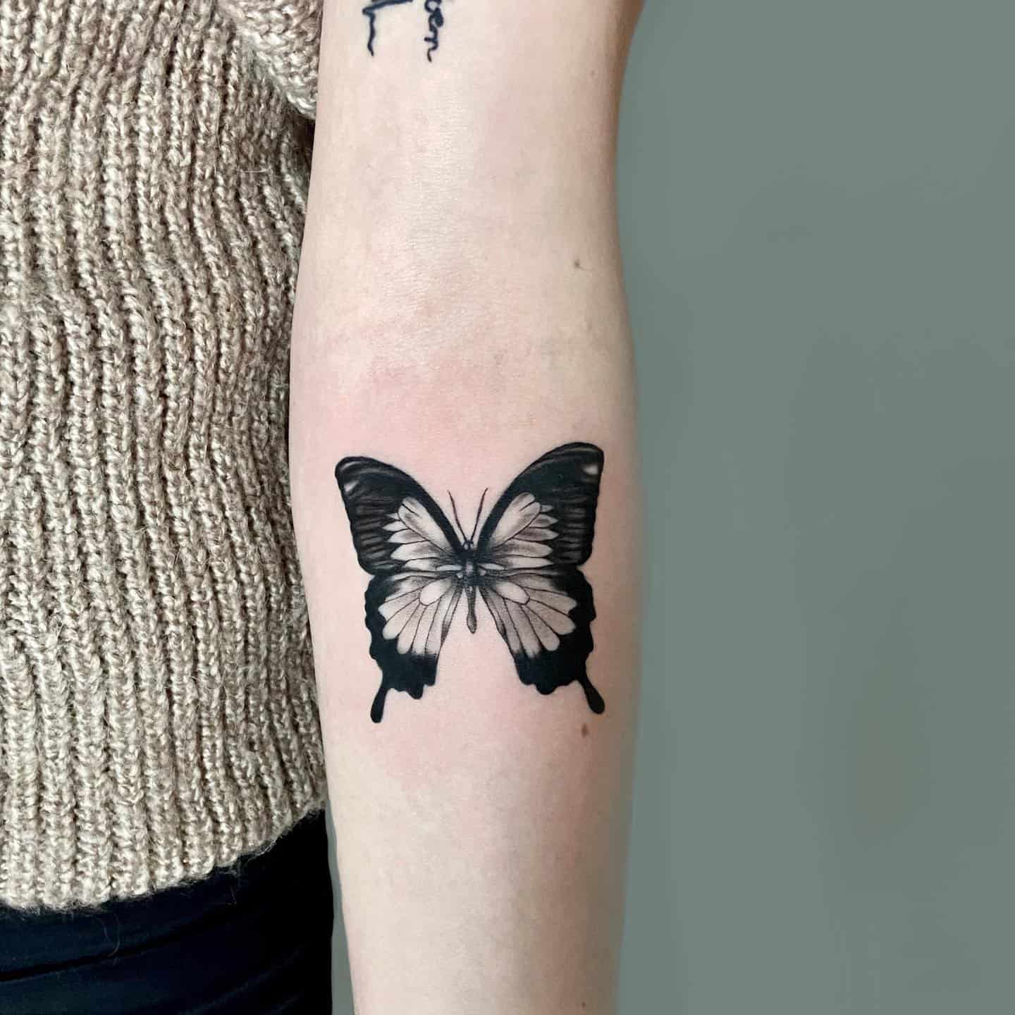 Realistic butterfly tattoo by freya ink