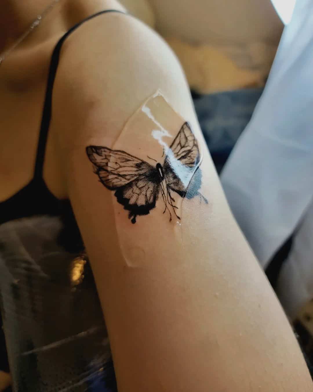 Realistic butterfly tattoo by m a.tiny .voice