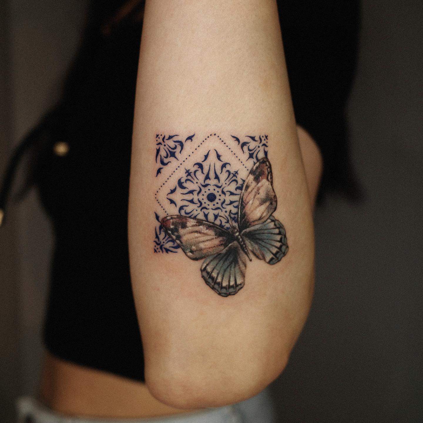 Realistic butterfly tattoo by tattoo rainn
