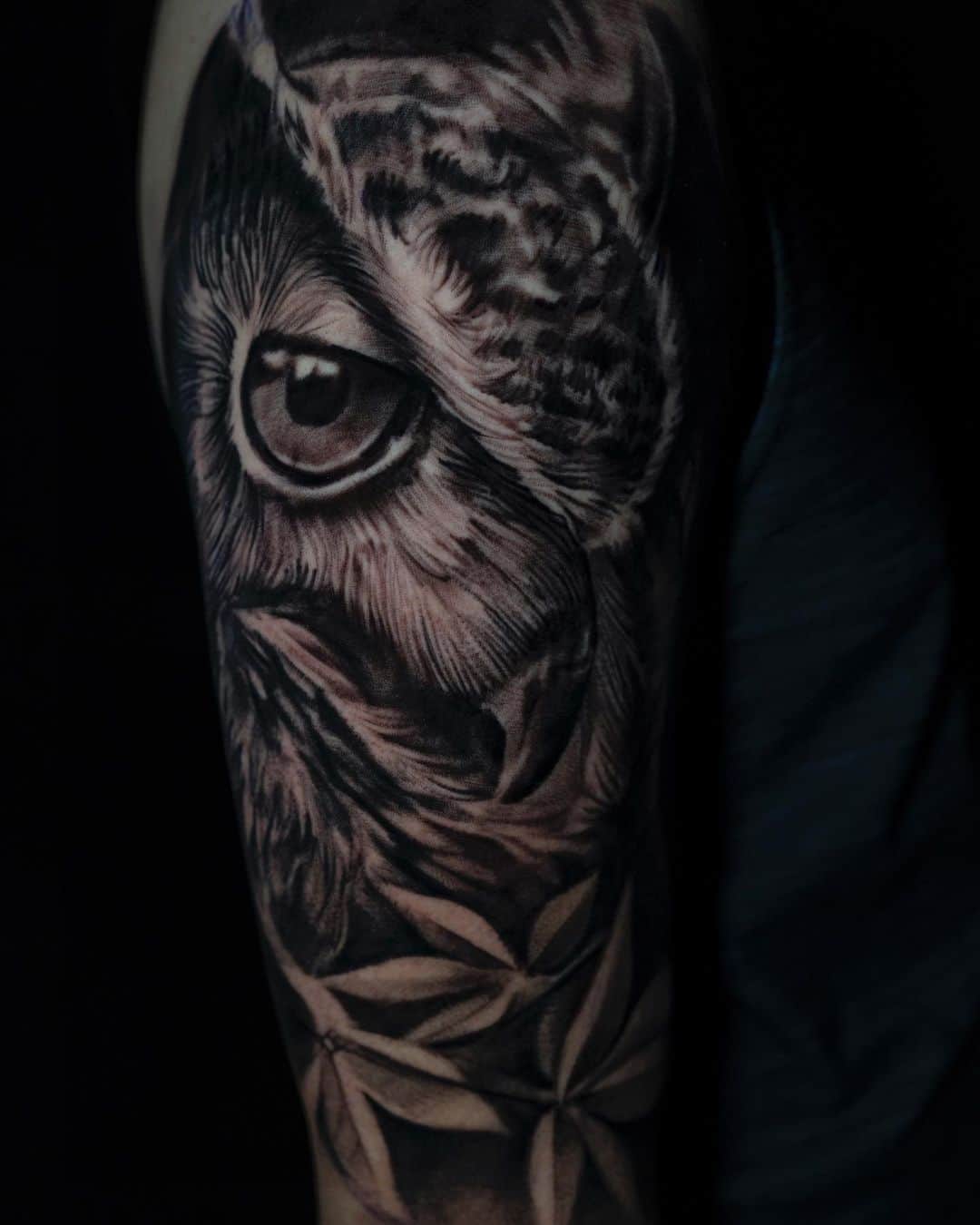 Realistic owl tattoo by santisierratattoo