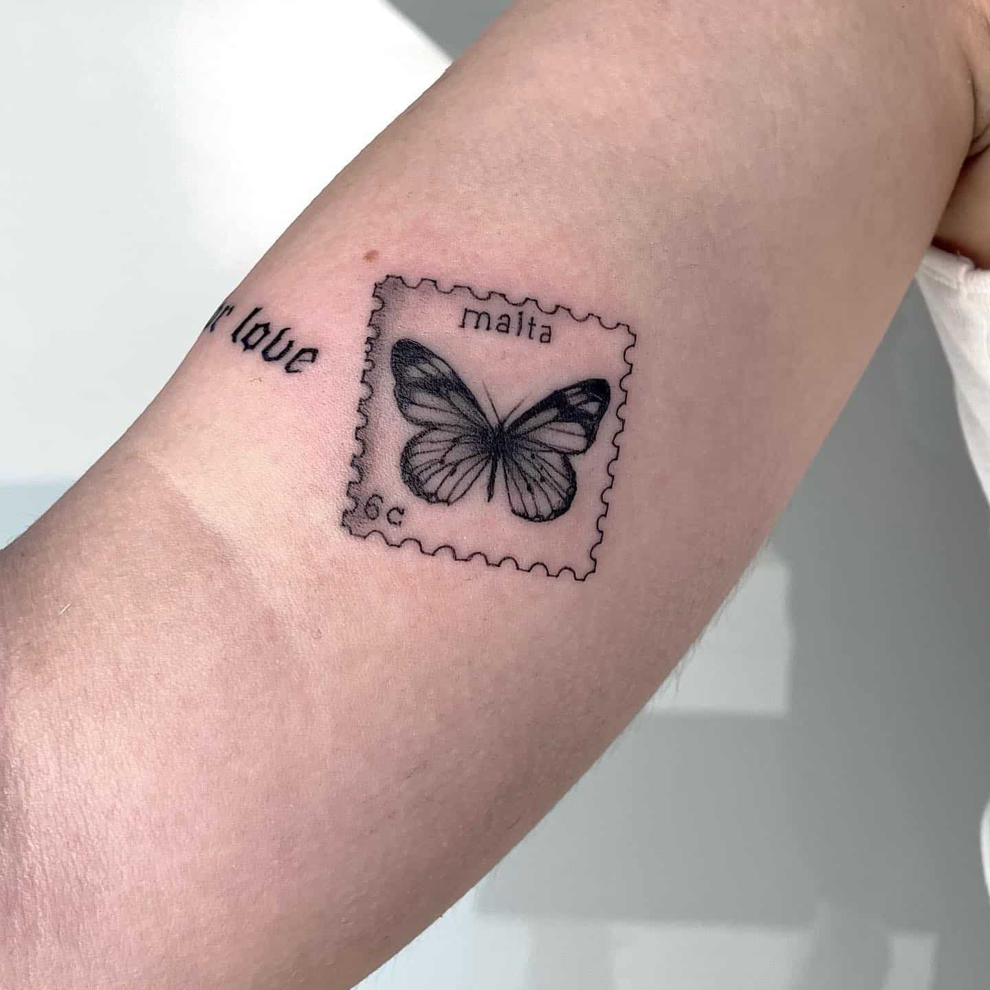 Small butterfly tattoo by 6moonstattoostudio