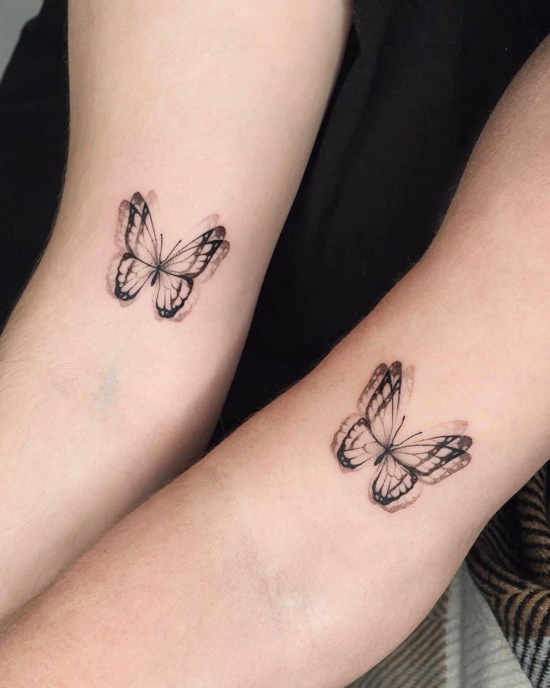 Small butterfly tattoo by mooji tt