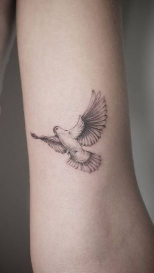 Small dove tattoo 1