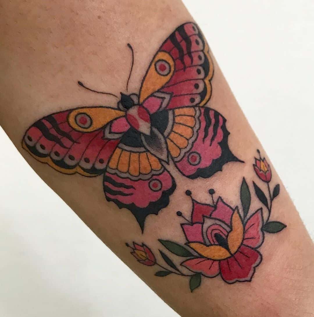 Traditional butterfly tattoo by sabrinatattooart