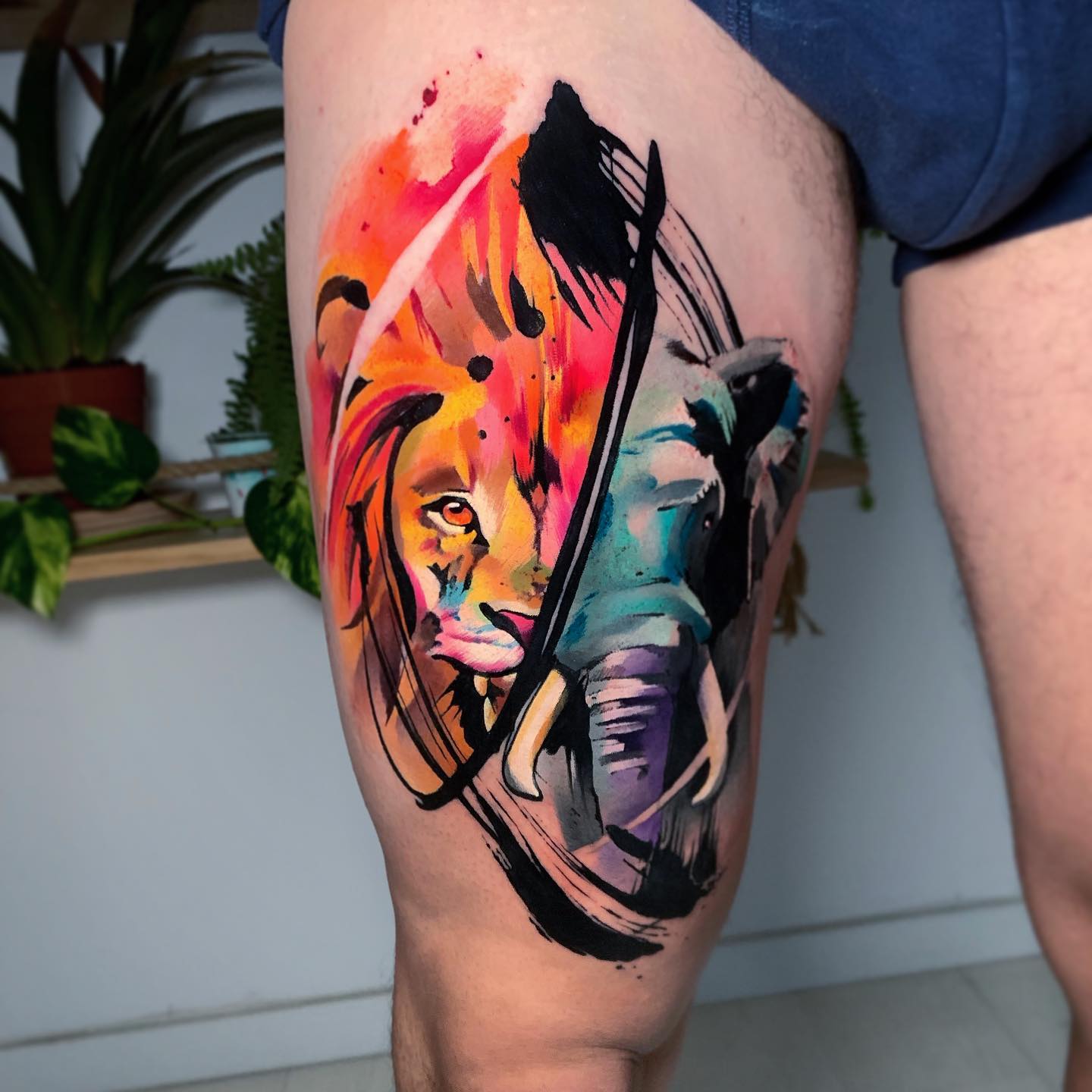 Watercolor elephant and lion tattoo by pablo ortiz tattoo