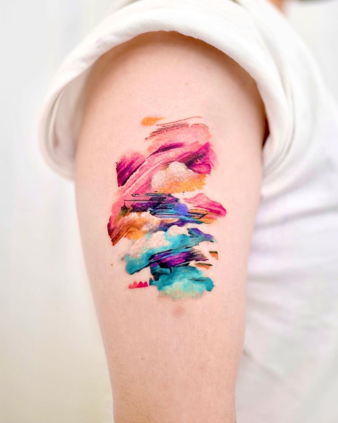 Watercolor tattoos by 9room tattoo