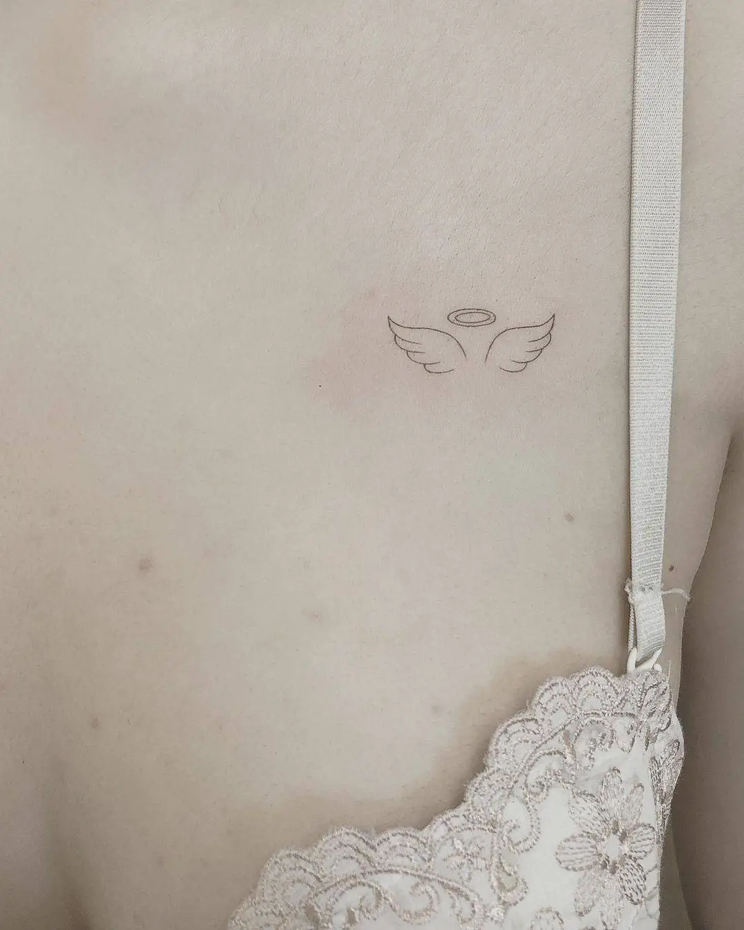 Angel wings tattoo by karin tattoo