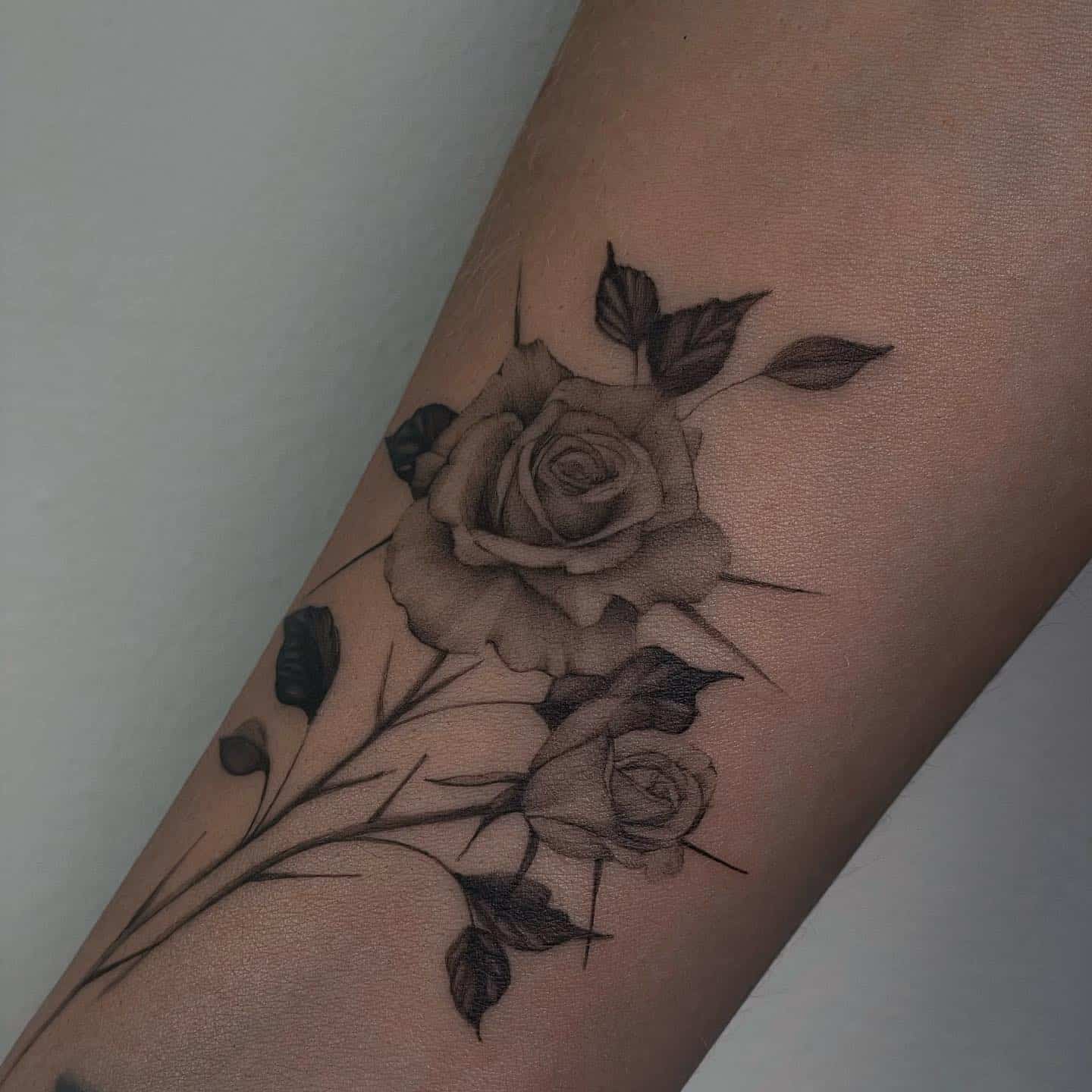 Black and grey rose tattoo by mozetatuazyk