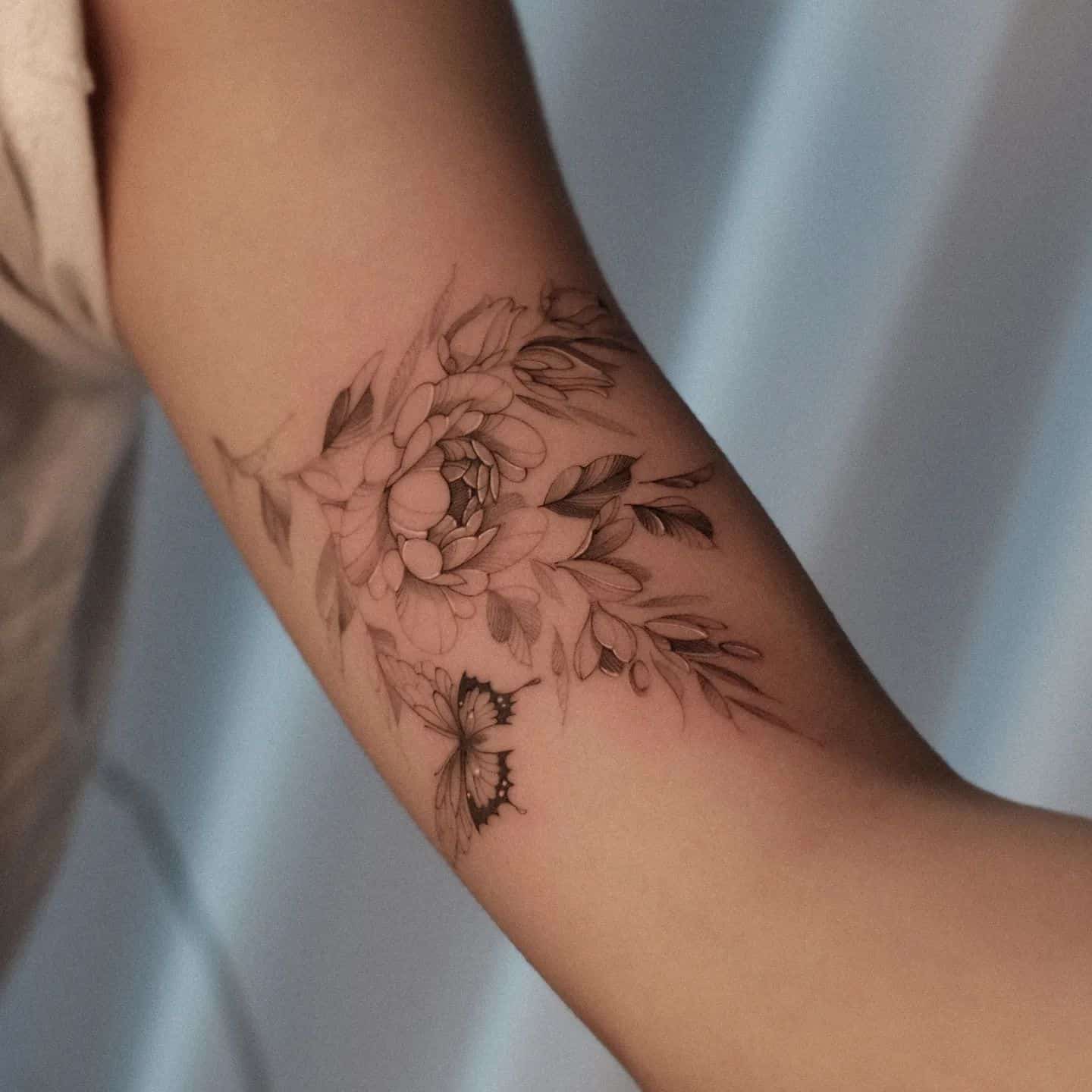 Black and grey rose tattoo by saku.tatt