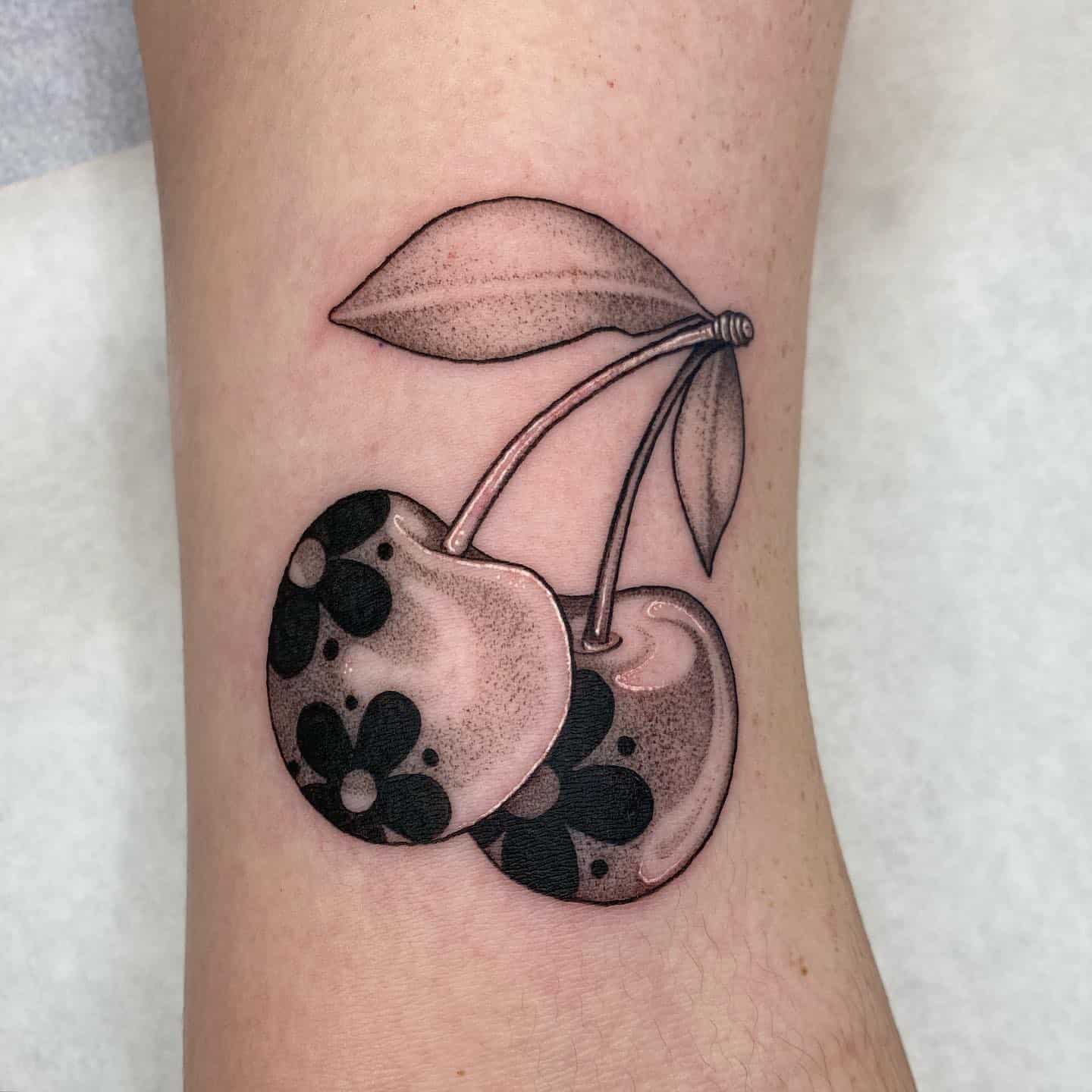 Black and white fruit tattoo by maken.ink