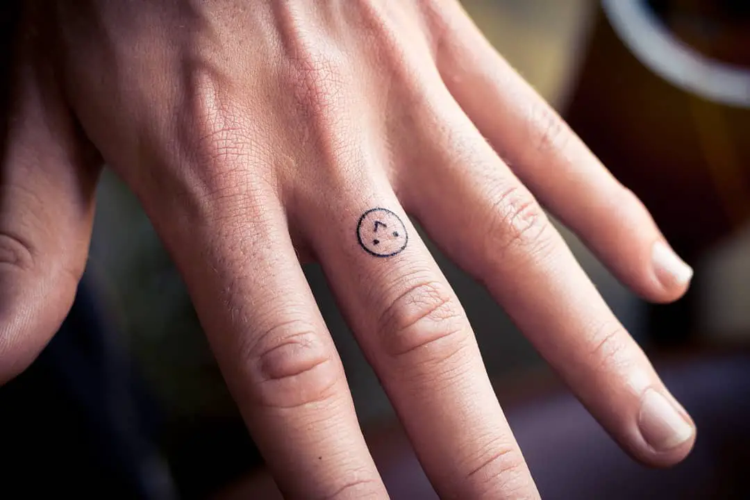 Black ink finger tattoo by sophiancholettattoo